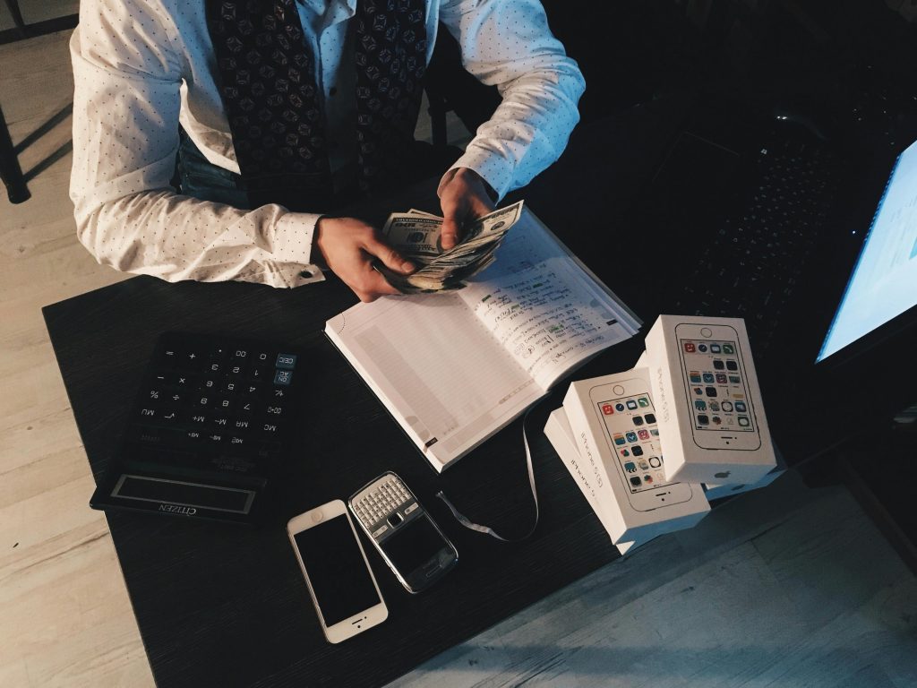 accountant counting money while working