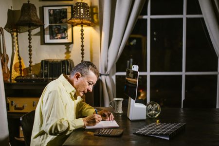 business owner writing on a table